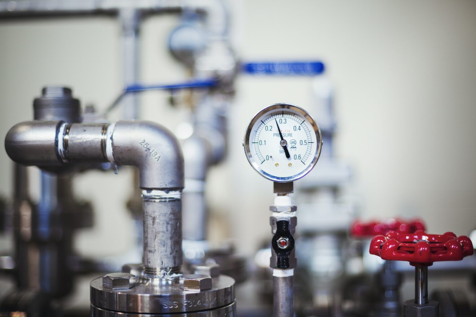 Machinery and gauge in a brewery.